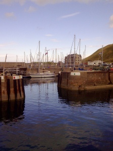 The narrow entrance to Whitehills Harbour - not much more than  one boat width which can be a challenge in windy weather!