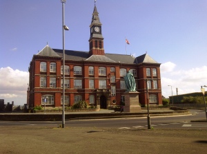The fine harbour offices at Grimsby with the statue of Prince Albert overlooking them. This building has been rescued and formed into modern offices.