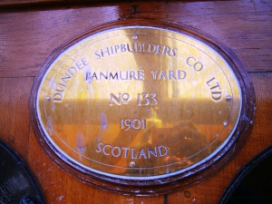 Makers plate for Discovery. The boat was constructed to the design of the Royal Navy designer of ships. It was constructed in Dundee as they had the greatest experience of building and sailing whaling boats for Arctic and ice bound regions.