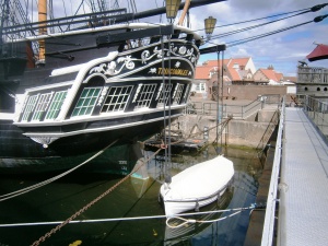 The ornate stern and captain's jolly boat.