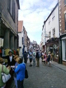 Church Street in old Whitby - largely traffic free and thronged with people and shops.