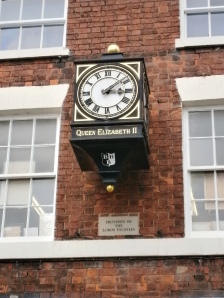 This commemorative clock was provided by the Lords Feoffes of Bridlington.   The charitable trust known as The Lords Feoffees and Assistants of the Manor of Bridlington was created in 1636. The Manor of Bridlington had been confiscated by Henry VIII from the monks of Bridlington Priory during the Dissolution of the Monasteries, in 1537. In 1624 James I conferred the Manor on Sir J. Ramsey, recently created Earl of Holderness, "as a reward for the great services the earl had performed by delivering his majesty from the conspirators of the Gowries, and also for the better support of the high dignity to which he had been lately raised". On inheriting it, his son Sir George Ramsey of Coldstream sold it in 1633 for £3,260 to William Corbett and twelve other inhabitants of Bridlington, to administrate it on behalf of themselves and all the other tenants and freeholders of the Manor. A deed, bearing the date 6 May 1636, was drawn up declaring these citizens as Lords Feoffees ("trustholders") of the Manor of Bridlington, and empowering them to enrol twelve more Assistants. Rules to elect new Lords Feoffees and Assistants have been adhered to for over three hundred years, and they continue to fulfill their original charter by donating money (earned from rent from the many properties they continue to own in the old town centre) to worthwhile causes in Bridlington, for example the funding of the offshore D CLass D 557 RNLI lifeboat Lord Feoffees III at Bridlington lifeboat station (East). The Feoffees were also directed to elect one of their number annually as chief Lord of the Manor, in whose name the courts should be called and the business of the town transacted. The election is still continued on the second day of February, and a manor court is held in the Town Hall in February and November.